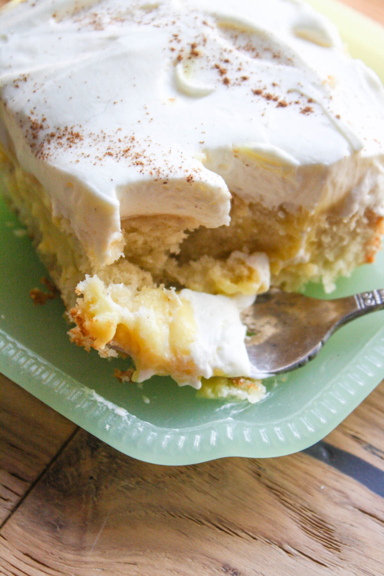 Eggnog Poke Cake with Whipped Cream Cheese Frosting