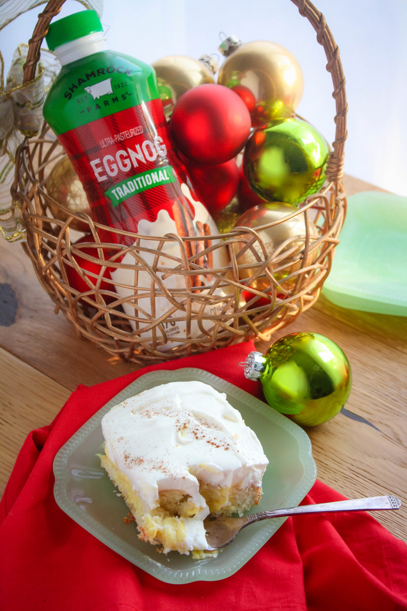 Eggnog Poke Cake with Whipped Cream Cheese Frosting